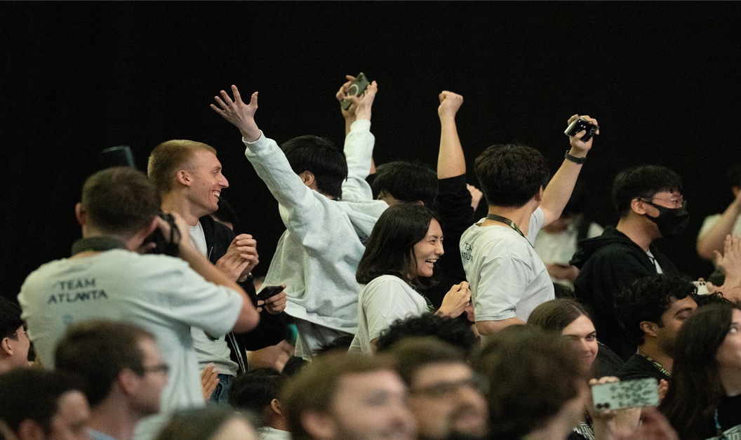 Team Atlanta celebrating at the AI Cyber Challenge