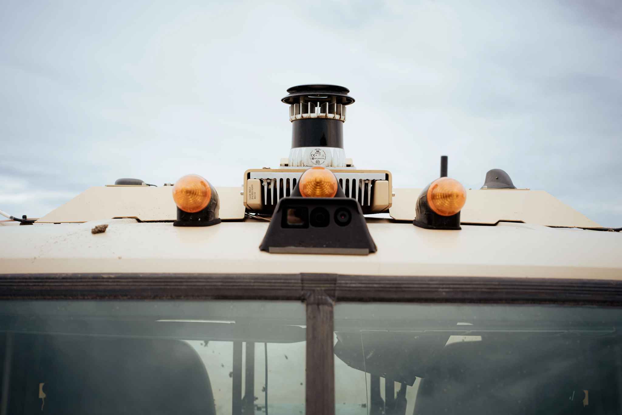 Ouster source photograph of vehicle-mounted lidar. General sensor-integration context; it does not depict the reported Lancer missions in Ukraine or establish the installed sensor generation.