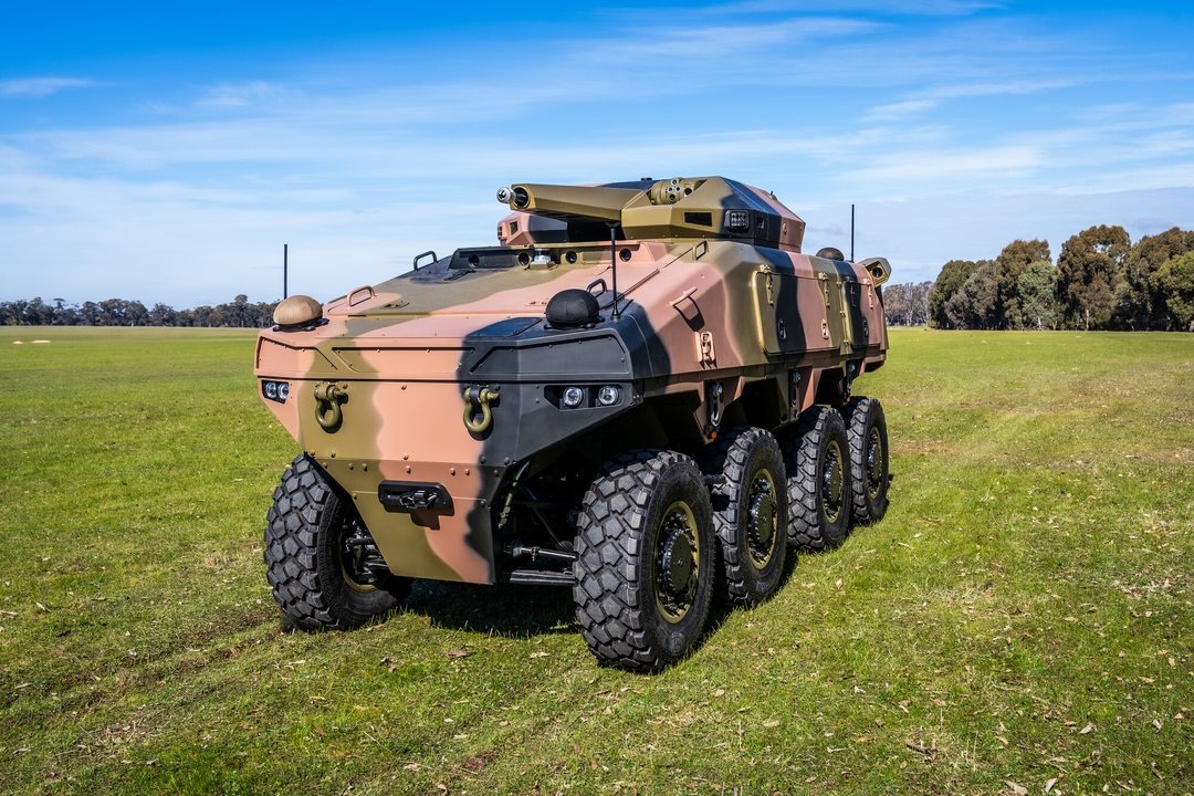 ATLAS eight-wheeled uncrewed vehicle on grass